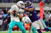 <p>Ryan Tannehill #17 of the Miami Dolphins is sacked with the ball by Anthony Barr #55 of the Minnesota Vikings in the third quarter of the game at U.S. Bank Stadium on December 16, 2018 in Minneapolis, Minnesota. (Photo by Adam Bettcher/Getty Images) </p>