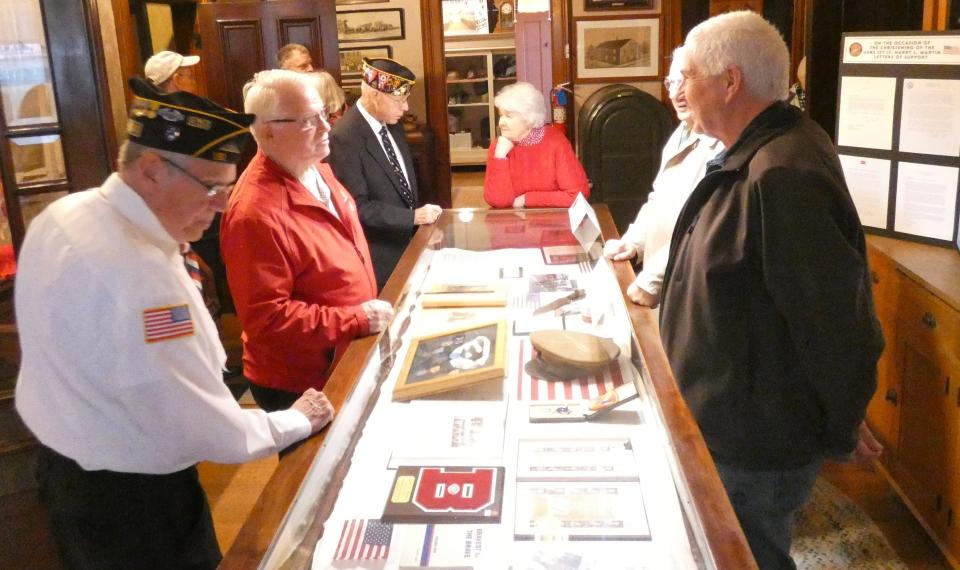 Following a special Veterans Day ceremony Friday, a special exhibit honoring Congressional Medal of Honor winner 1st Lt. Harry L. Martin was open at the Bucyrus Historical Society's Scroggs House Museum.