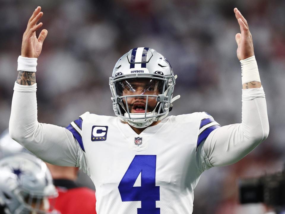 Dak Prescott of the Dallas Cowboys warms up prior to a game against the San Francisco 49ers in the NFC Wild Card Playoff game at AT&T Stadium