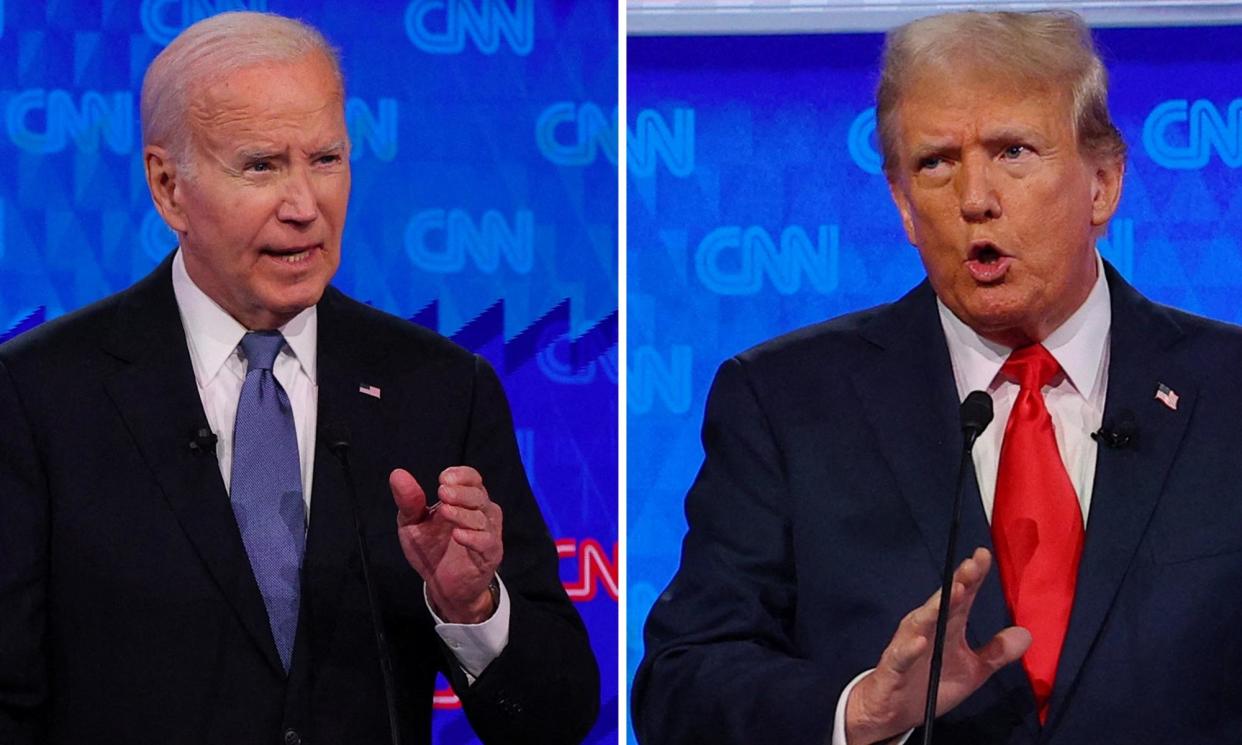 <span>Joe Biden and Donald Trump at CNN’s Atlanta studio, on Thursday.</span><span>Photograph: Brian Snyder/Reuters</span>