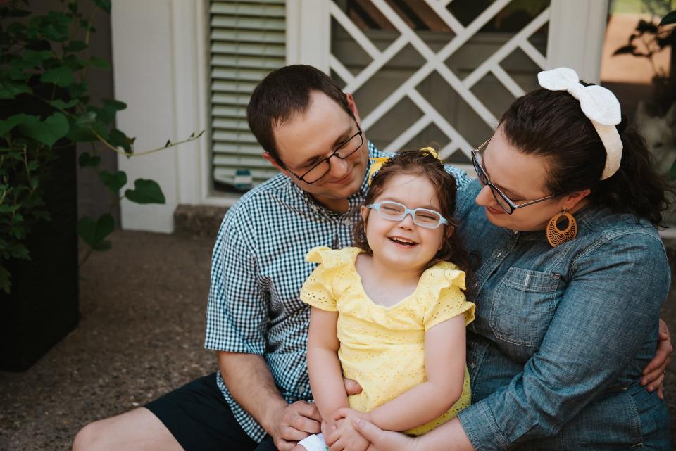 Dr. SarahBeth Hartlage, then-interim medical director at Louisville Metro Department of Public Health and Wellness, is seen with her husband, Todd and daughter, Camille, in 2020.
