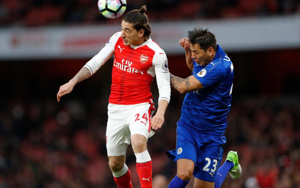 Arsenal's Hector Bellerin in action with Leicester City's Leonardo Ulloa - Credit: REUTERS