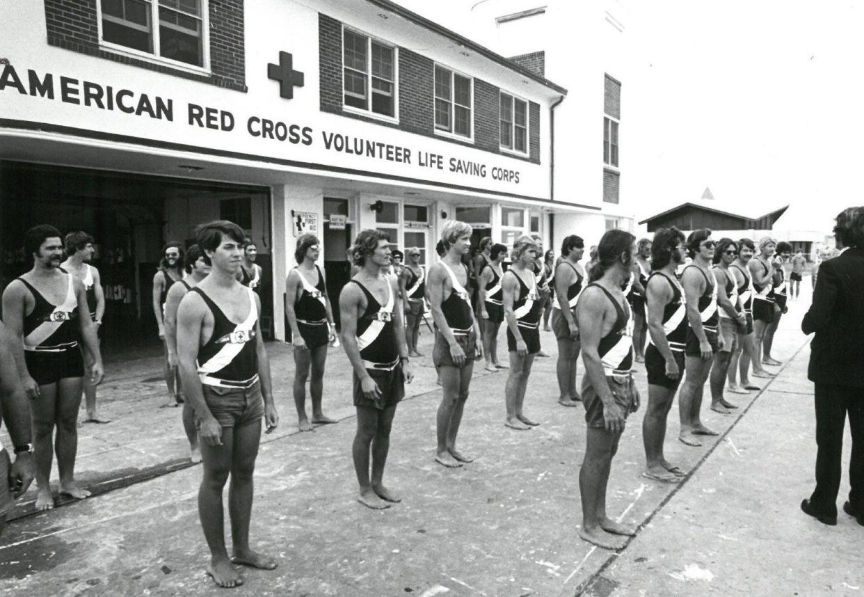 Volunteer lifeguards line up in front of the Jacksonville Beach lifeguard station on May 5, 1974.  The guards have been a big part of the beach city's history and traditions for more than a century, though that could be coming to an end.