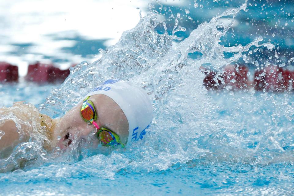 Stillwater's Avery Littlefield competes in the 100-yard freestyle during the Class 6A state swim meet Saturday in Jenks.