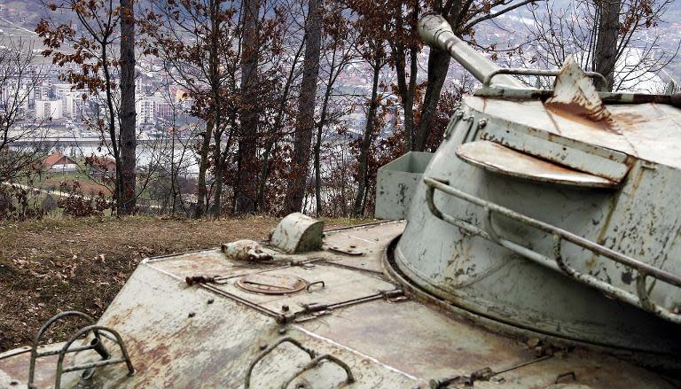 File picture shows an abandoned Serbian tank still parked in a firing position overlooking the center of the eastern Bosnian town of Gorazde