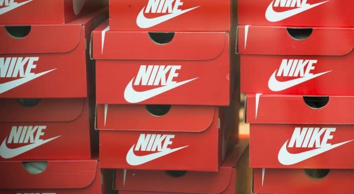 a stack of red Nike (NKE) shoe boxes