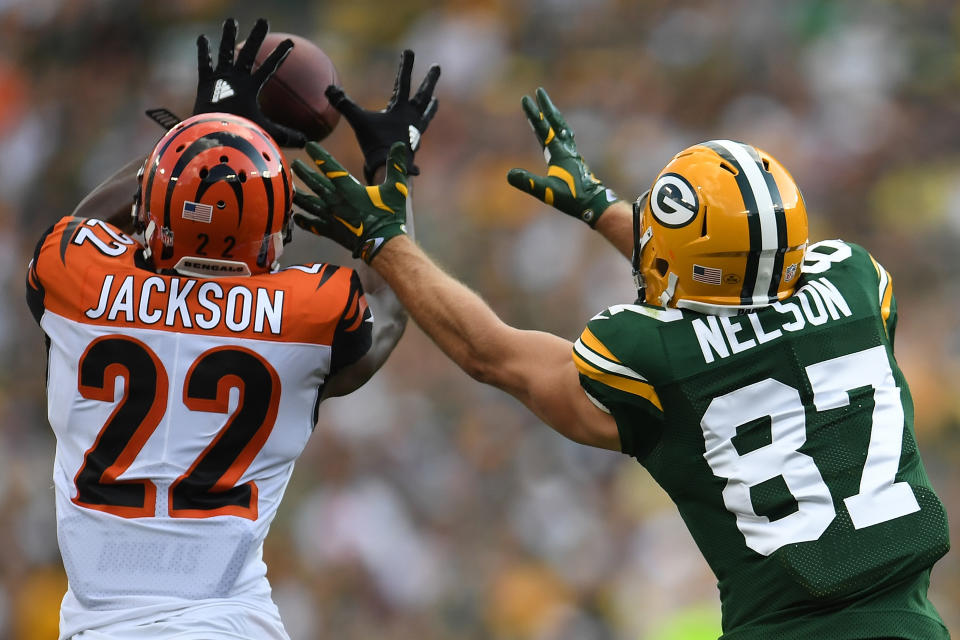 <p>William Jackson #22 of the Cincinnati Bengals intercepts a pass from Aaron Rodgers #12 (not pictured) to Jordy Nelson #87 of the Green Bay Packers at Lambeau Field on September 24, 2017 in Green Bay, Wisconsin. Jackson returned the interception for a 75-yard touchdown. (Photo by Stacy Revere/Getty Images) </p>