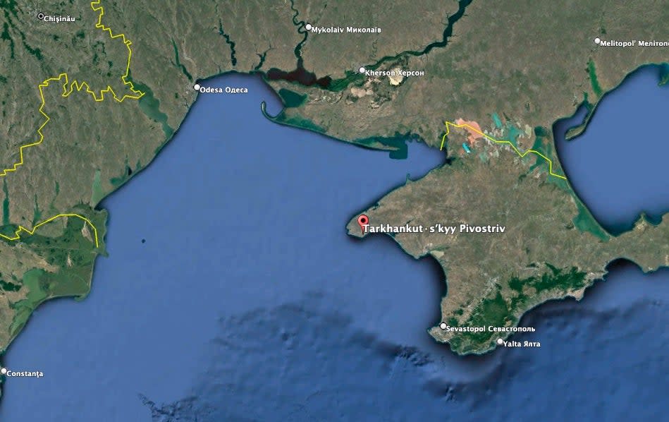 Frogmen from Ukraine's Defense Intelligence Directorate say they traveled across the Black Sea to attack a Russian base on the occupied Crimean peninsula at Cape Tarkhanhut. (Google Earth image)