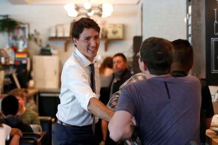FILE PHOTO: Canada's Prime Minister Trudeau meets with guests at a diner in Calgary