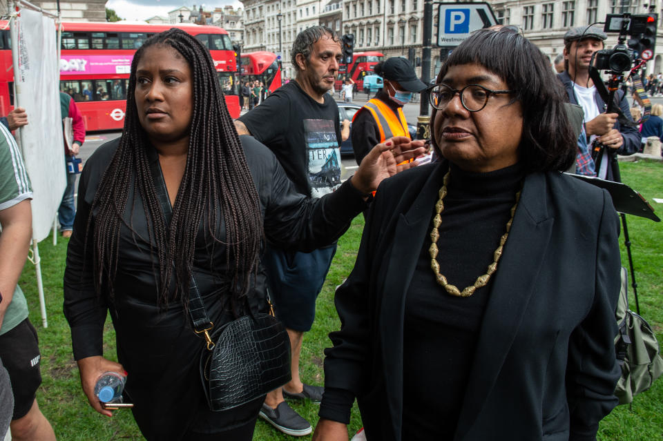 LONDON, ENGLAND - SEPTEMBER 10: Labour MPs Diane Abbott (R) and Bell Ribeiro Addy (L) arrive to join demonstrators gathering to protest the killing of Chris Kaba on September 10, 2022 in London, England. Chris Kaba,24, was shot dead by a Metropolitan Police Officer after a police pursuit of a car ended in Streatham Hill, London, No firearms were found at the scene. (Photo by Guy Smallman/Getty Images)