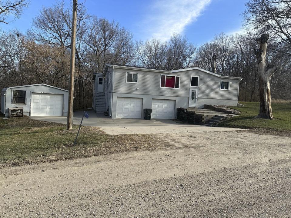 FILE - The isolated home where Linda Childers was killed during a break-in on Aug. 13, 2023, is shown on Dec. 14, about a mile outside Fort Calhoun, Neb. Prosecutors have decided not to seek the death penalty in the December killing of a Catholic priest inside his home, but they are pursuing execution in the brutal killing of Childers, a retiree, during a break-in that happened in the same tiny Nebraska town four months earlier. (AP Photo/Josh Funk, File)