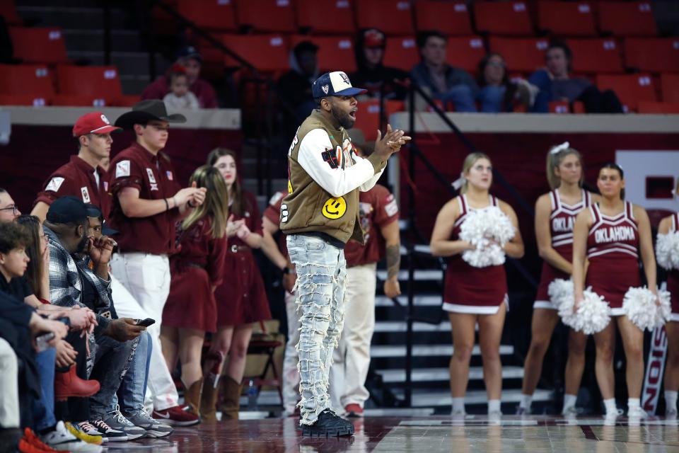 Ryan Glaspie cheers during the OU women's basketball team's game against TCU at Lloyd Noble Center in Norman on Jan. 31.
