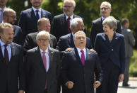 British Prime Minister Theresa May, European Commission President Jean-Claude Juncker and Hungarian Prime Minister Viktor Orban pose among other heads of state during the family photo at the EU-Western Balkans Summit in Sofia, Bulgaria, May 17, 2018. Vassil Donev/Pool via Reuters
