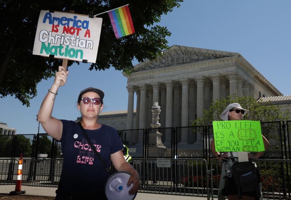 Abortion rights activists protest in front of the Supreme Court on Thursday, June 29, 2022, in Washington, D.C.