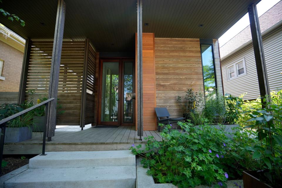 The Riverwest home of Juli Kaufmann and Mike Maschek, pictured on June 19, 2023, is modern and has unique gardens including a green roof that changes colors with the season. The home will be part of the Riverwest Secret Garden Tour on July 9.