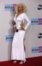 Singer Christina Aguilera arrives at the 41st American Music Awards in Los Angeles, California November 24, 2013. REUTERS/Mario Anzuoni (UNITED STATES - Tags: ENTERTAINMENT) (AMA-ARRIVALS)