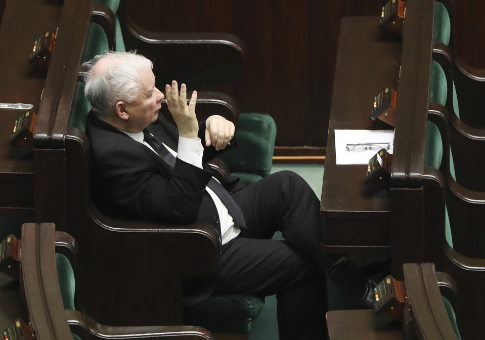 Jaroslaw Kaczynski, leader of Poland's ruling conservative Law and Justice party, takes part in a parliamentary session in Warsaw, Poland, Monday, April 6, 2020. Uncertainty over whether Poland will hold a postal presidential election during the COVID-19 coronavirus pandemic deepened Monday after a deputy prime minister resigned, leaving Kaczynski's ruling party without enough votes to approve an exclusively mail-in ballot. AP Photo/Czarek Sokolowski)