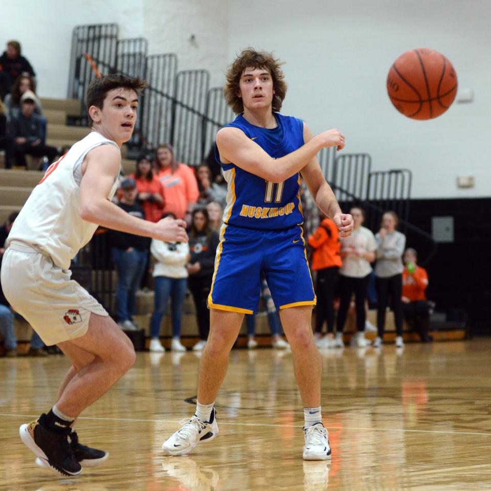 Jack Porter passes to a teammate during visiting West Muskingum's loss to New Lexington last season. Porter is one of several starters back for the Tornadoes, who expect to contend in the MVL Small School Division.