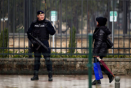 Police guard the United States embassy building in Podgorica, Montenegro, February 22, 2018. REUTERS/Stevo Vasiljevic