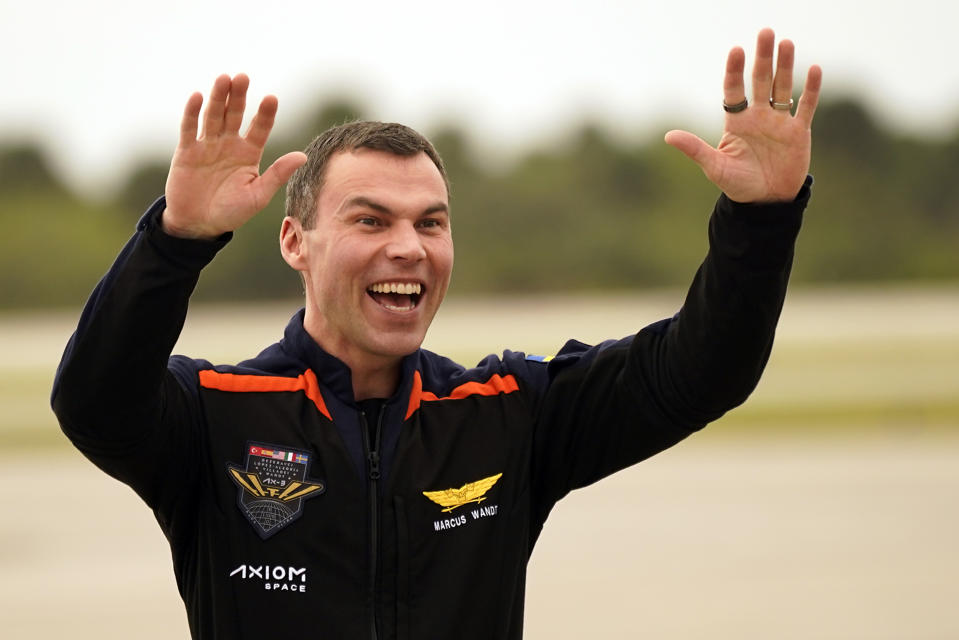 Axiom-3 mission specialist Marcus Wandt, of Sweden waves to family members as he arrives at the Kennedy Space Center to prepare for this evenings launch to the International Space Station in Cape Canaveral, Fla., Thursday, Jan. 18, 2024. (AP Photo/John Raoux)