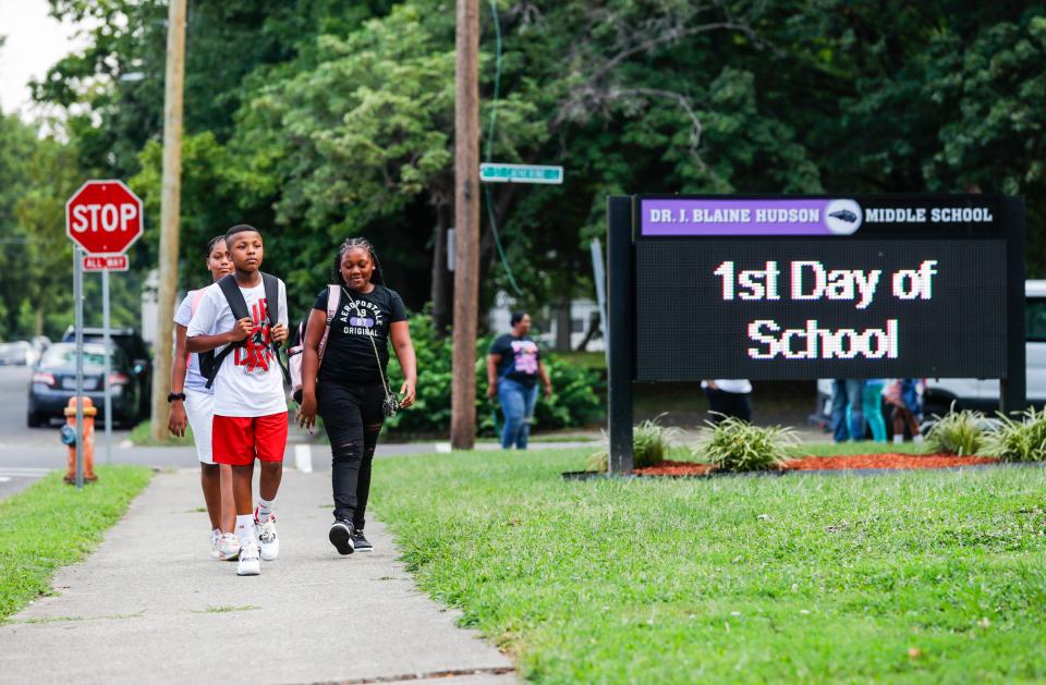 Students walk towards J. Blaine Hudson Middle School Wednesday morning for the first day of classes. Aug. 9, 2023.