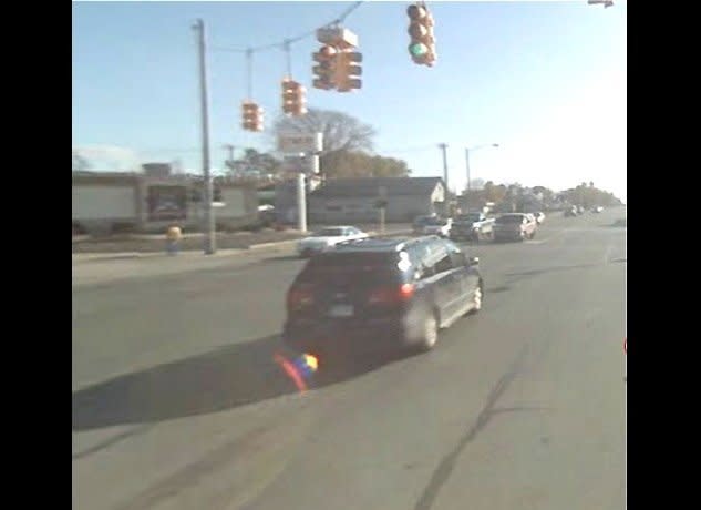 This lens flare appears to be following a car. The Google Maps image was created in October 2008 at Escanaba, Mich. Submitted to Huffington Post by Mary Robinson.