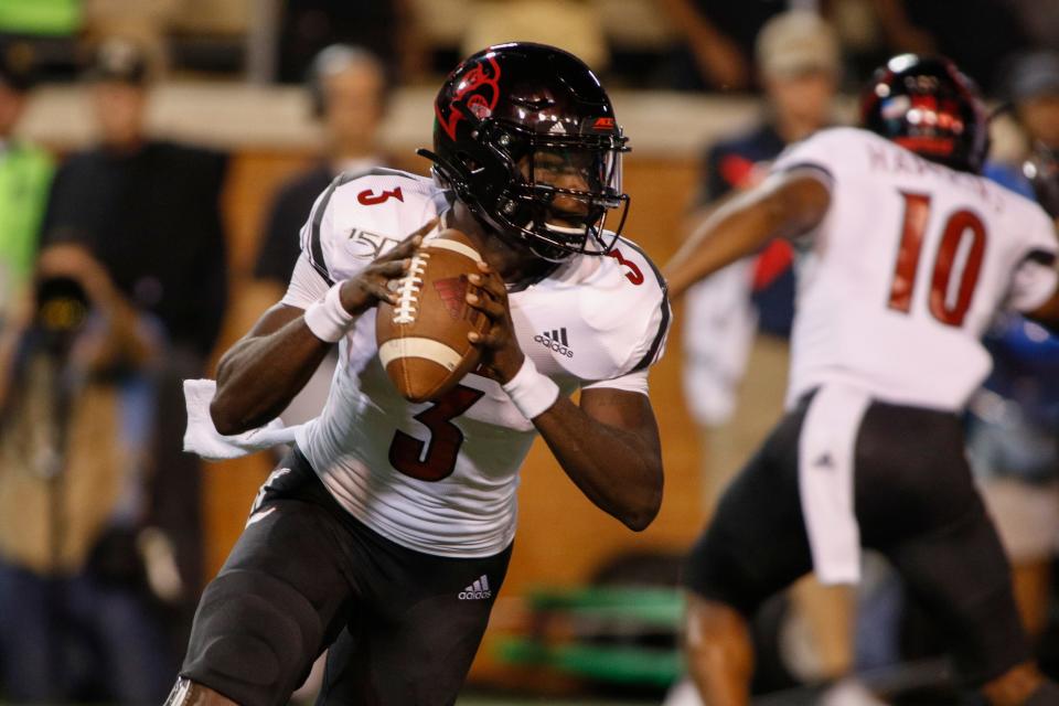 Louisville quarterback Malik Cunningham looks to pass against Wake Forest during the first half of an NCAA college football game in Winston-Salem, N.C., Saturday, Oct. 12, 2019. (AP Photo/Nell Redmond)