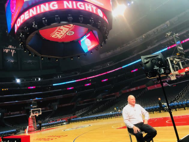 Steve Ballmer conducts a remote TV interview from Staples Center in advance of the Clippers home opener Wednesday night in Los Angeles. (GeekWire Photo / Todd Bishop)