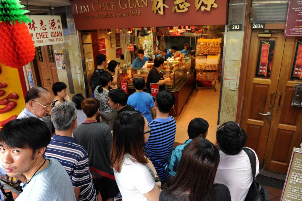 People queue to buy bak kwa at Lim Chee Guan in Chinatown.