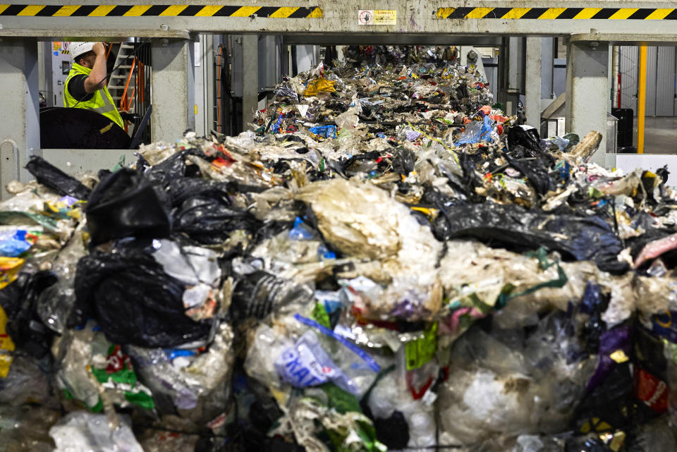 Plastic waste runs on conveyor belts at a new plastic waste sorting facility in Motala, central Sweden, Thursday, Nov. 9, 2023. Sweden launched a new state-of-the-art plastic sorting facility, the largest of its kind in the world, and big enough to receive all plastic packaging waste generated from Swedish households. (AP Photo/David Keyton)