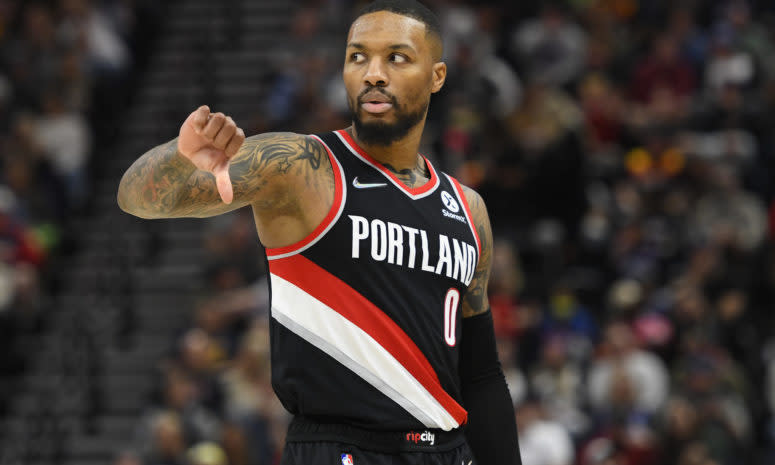 Portland Trail Blazers superstar point guard Damian Lillard gives a thumbs down.