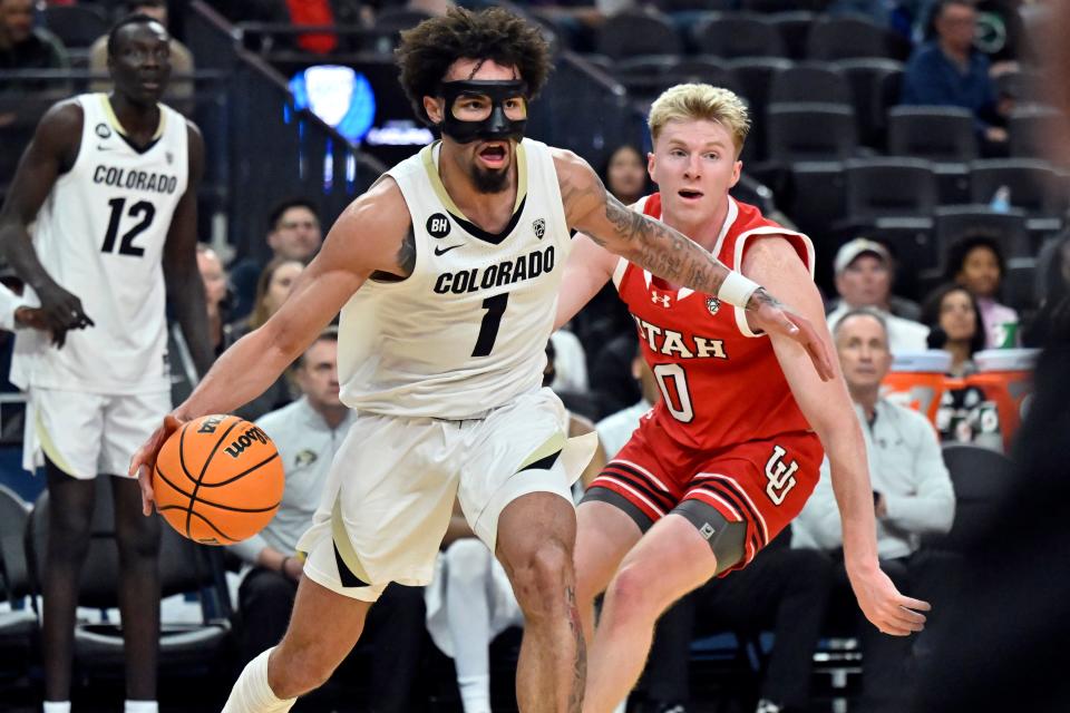 LAS VEGAS, NEVADA - MARCH 14: J'Vonne Hadley #1 of the Colorado Buffaloes drives against the Utah Utes in the second half of a quarterfinal game of the Pac-12 Conference basketball tournament at T-Mobile Arena on March 14, 2024 in Las Vegas, Nevada. The Buffaloes defeated the Utes 72-58. (Photo by David Becker/Getty Images)