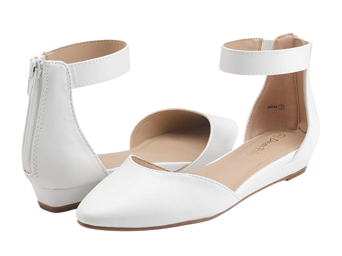 A pair of white shoes with ankle straps.