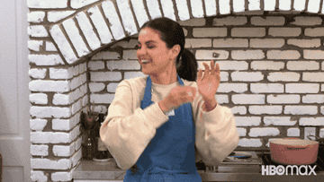 Selena Gomez dancing in her kitchen