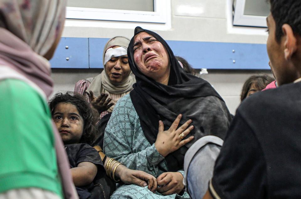 Wounded Palestinians  pictured at the Ahli Arab hospital in Gaza City (Copyright 2023 The Associated Press. All rights reserved.)