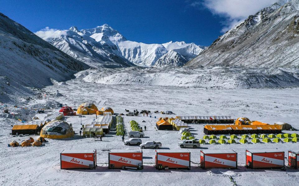 China has canceled attempts to climb Mount Everest from its side of the world's highest peak because of fears of importing COVID-19 cases from neighboring Nepal - Purbu Zhaxi /  Xinhua