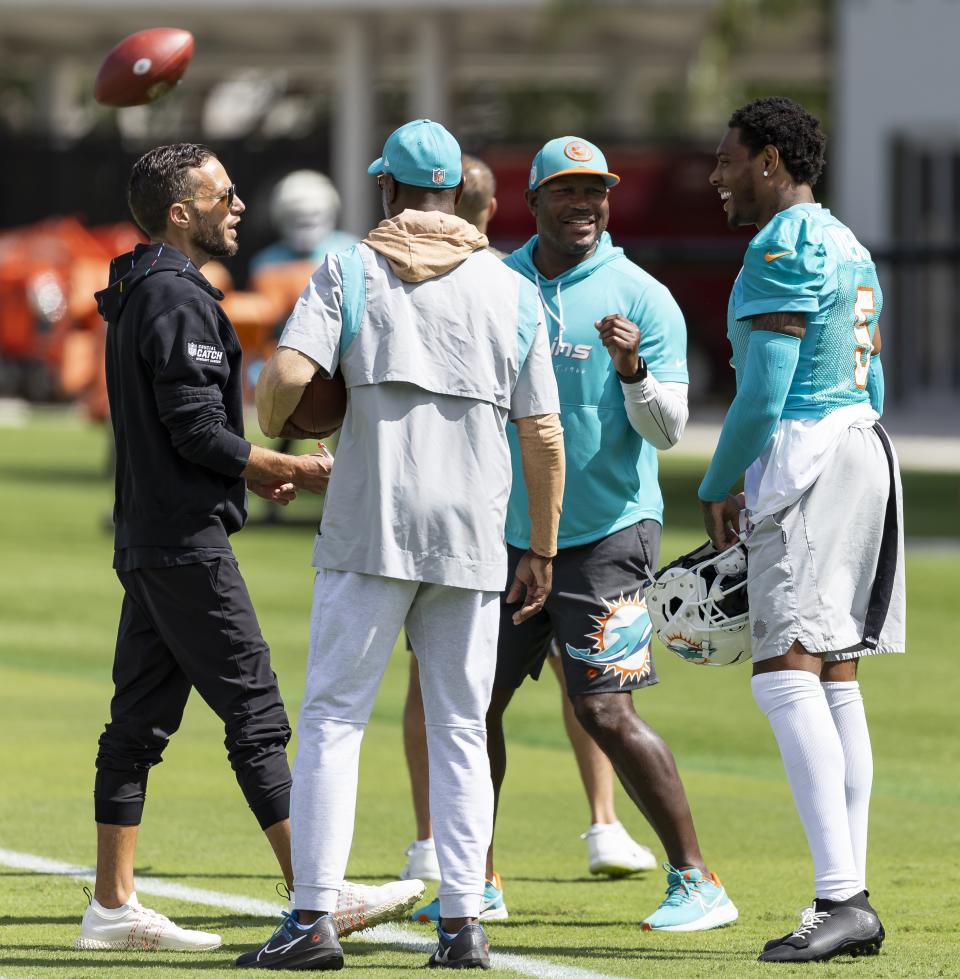 Miami Dolphins cornerback Jalen Ramsey (5) talks with head coach Mike McDaniel during NFL football practice at the Baptist Health Training Complex in Miami Gardens, Fla., Wednesday, Oct. 18, 2023 (Matias J. Ocner/Miami Herald via AP)