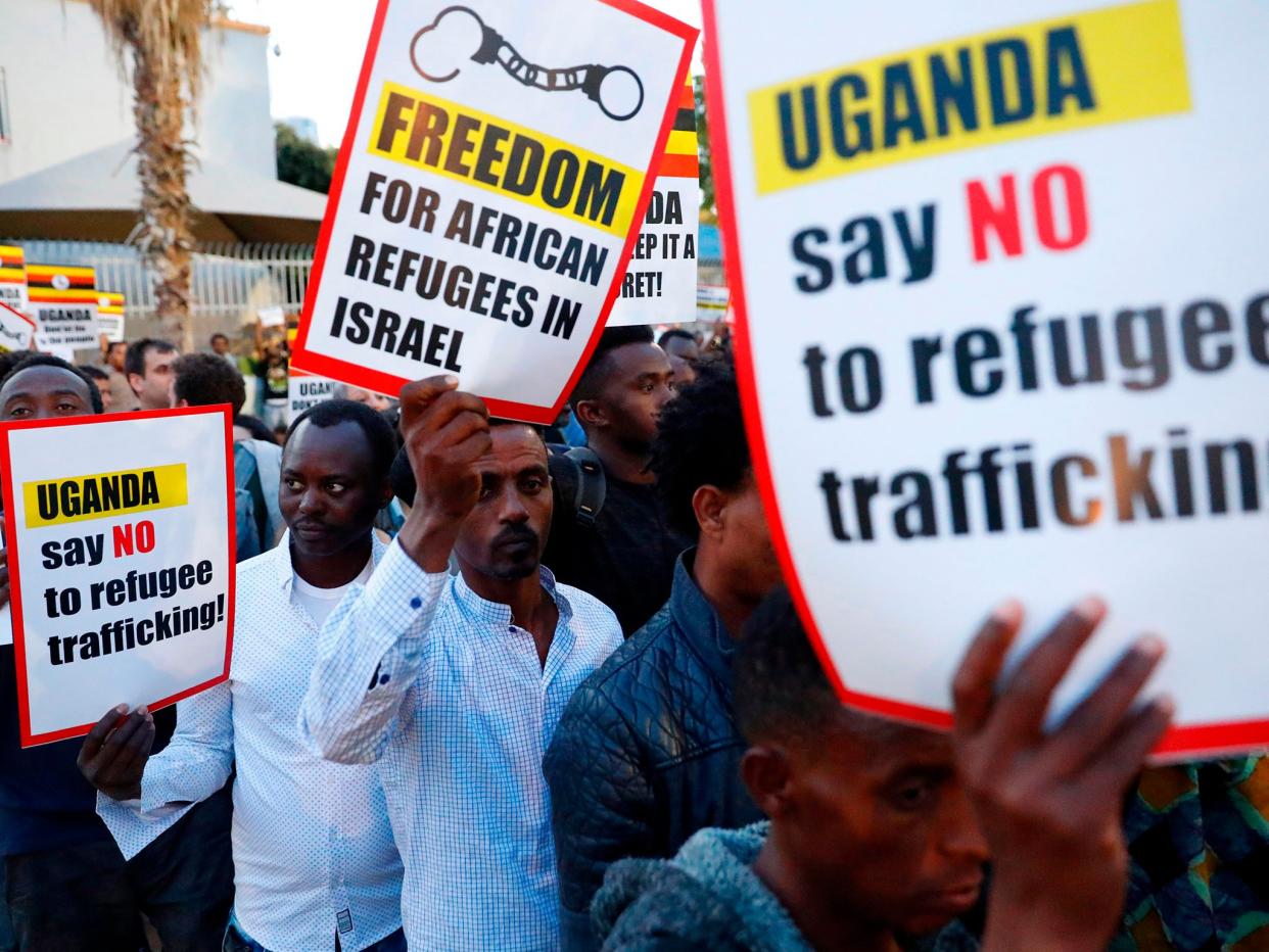 African migrants and Israelis demonstrate in Tel Aviv on April 9, 2018 against the Israeli government's policy to forcibly deport African refugees and asylum seekers: Getty