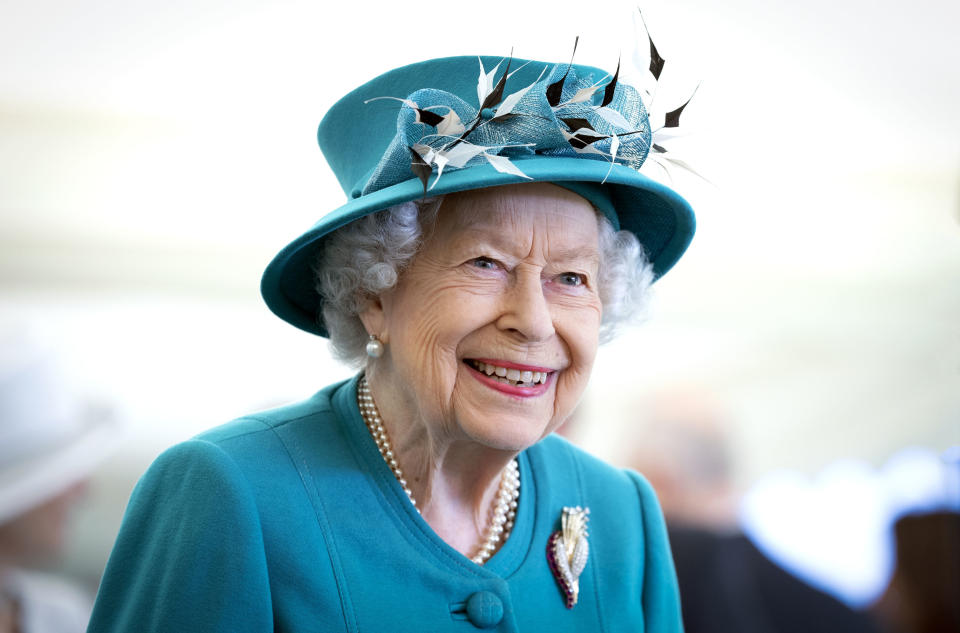 EDINBURGH, SCOTLAND - JULY 01: Queen Elizabeth II smiles during a visit to the Edinburgh Climate Change Institute, as part of her traditional trip to Scotland for Holyrood Week on July 1, 2021 in Edinburgh, Scotland. (Photo by Jane Barlow - WPA Pool/Getty Images)