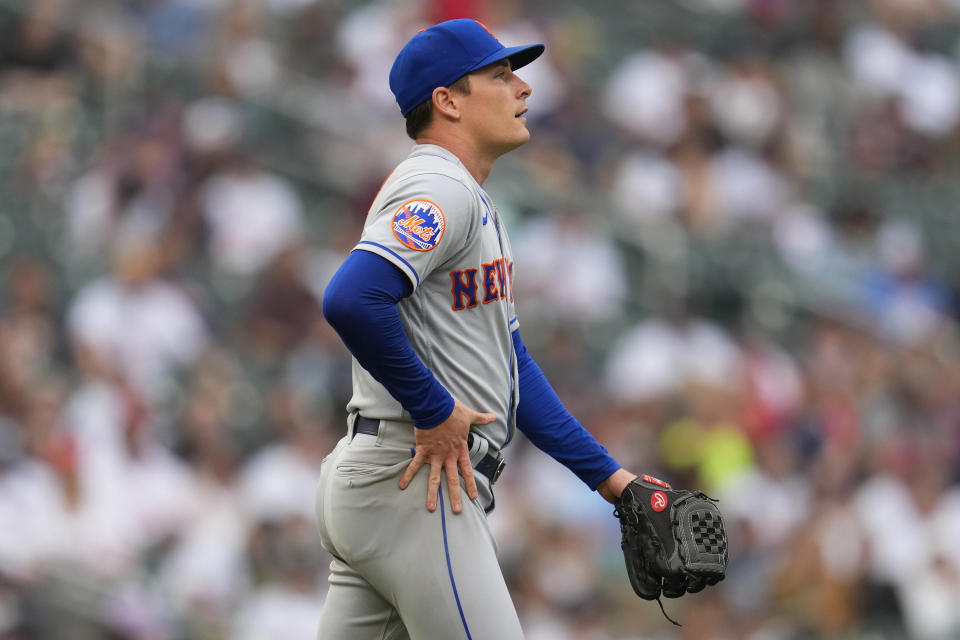 New York Mets relief pitcher Drew Smith reacts after issuing a walk to Minnesota Twins' Alex Kirilloff during the seventh inning of a baseball game Saturday, Sept. 9, 2023, in Minneapolis. (AP Photo/Abbie Parr)