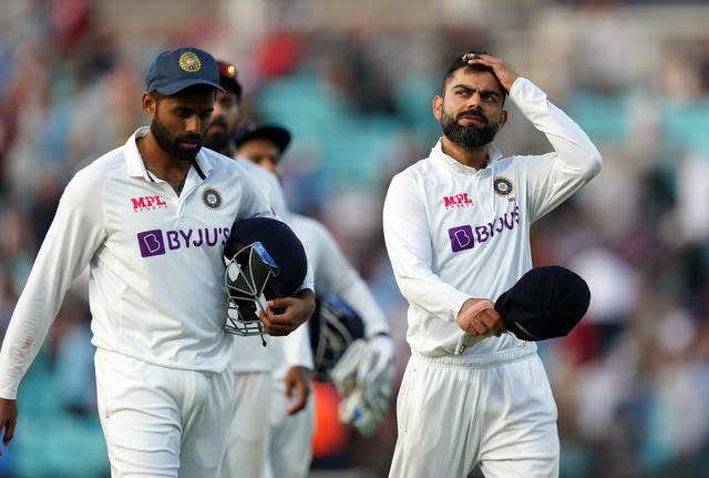 Virat Kohli and India walk off the field