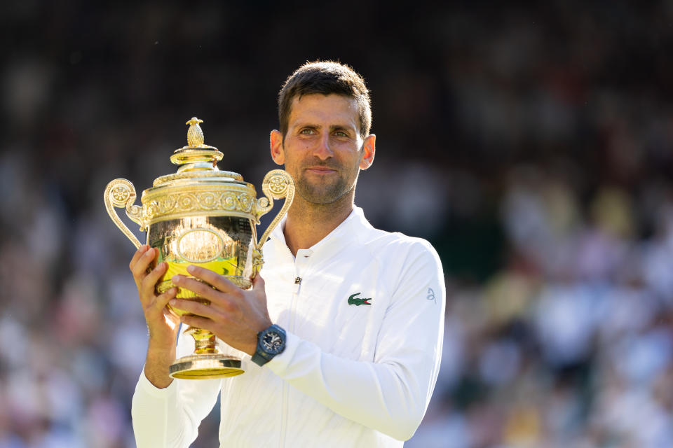 Seen here, Novak Djokovic with his 21st major singles title after winning Wimbledon in 2022.