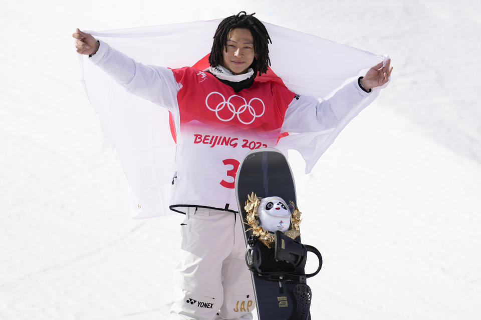 Ayumu Hirano, pictured here after winning gold in the men's snowboard halfpipe at the Winter Olympics.