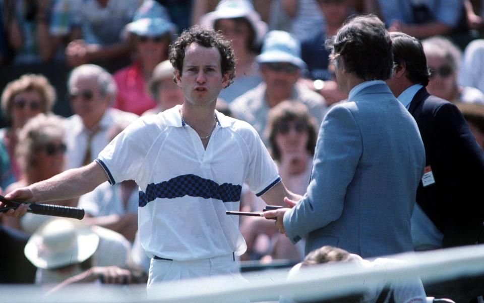 John McEnroe (left) and Alan Mills -