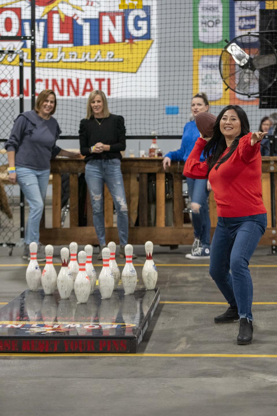 Beer, Booze & Bonks takes place Saturday at Fowling Warehouse. Jina Ehlers of Mason has her turn at knocking down the pins at the event in 2021.