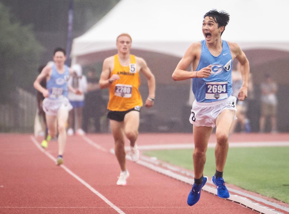 Georgetown runner Joseph Wienen smiles as he sprints toward the finish line to win the 3,200-meter run at the Class 5A state track and field meet Friday at Myers Stadium. "That's the most emotion I've felt after a race in my life," Wienen said.