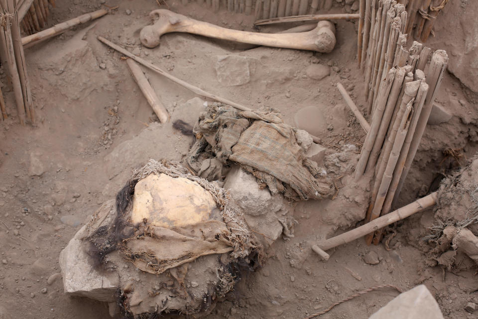 The remains of a mummy that, according to archaeologists, belongs to the pre-Inca Ychsma culture that inhabited the central coast of Peru from approximately 900 to 1450 A.D. is pictured at the Huaca La Florida archaeological site in Lima, Peru, Nov. 21, 2023. / Credit: Reuters/Anthony Marina