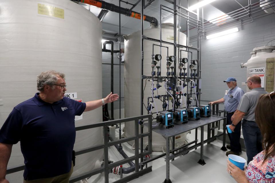 Some of the tanks and the calibration equipment for the chemicals used for water treatment are being shown in tours Thursday, May 16, 2024, at the dedication of the new Juday Creek Wellfield and Water Treatment Plant on Veterans Parkway.