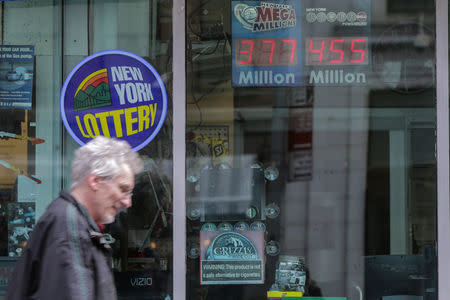 The Powerball prize displays at a gas station in New York City, U.S., March 17, 2017. REUTERS/Jeenah Moon