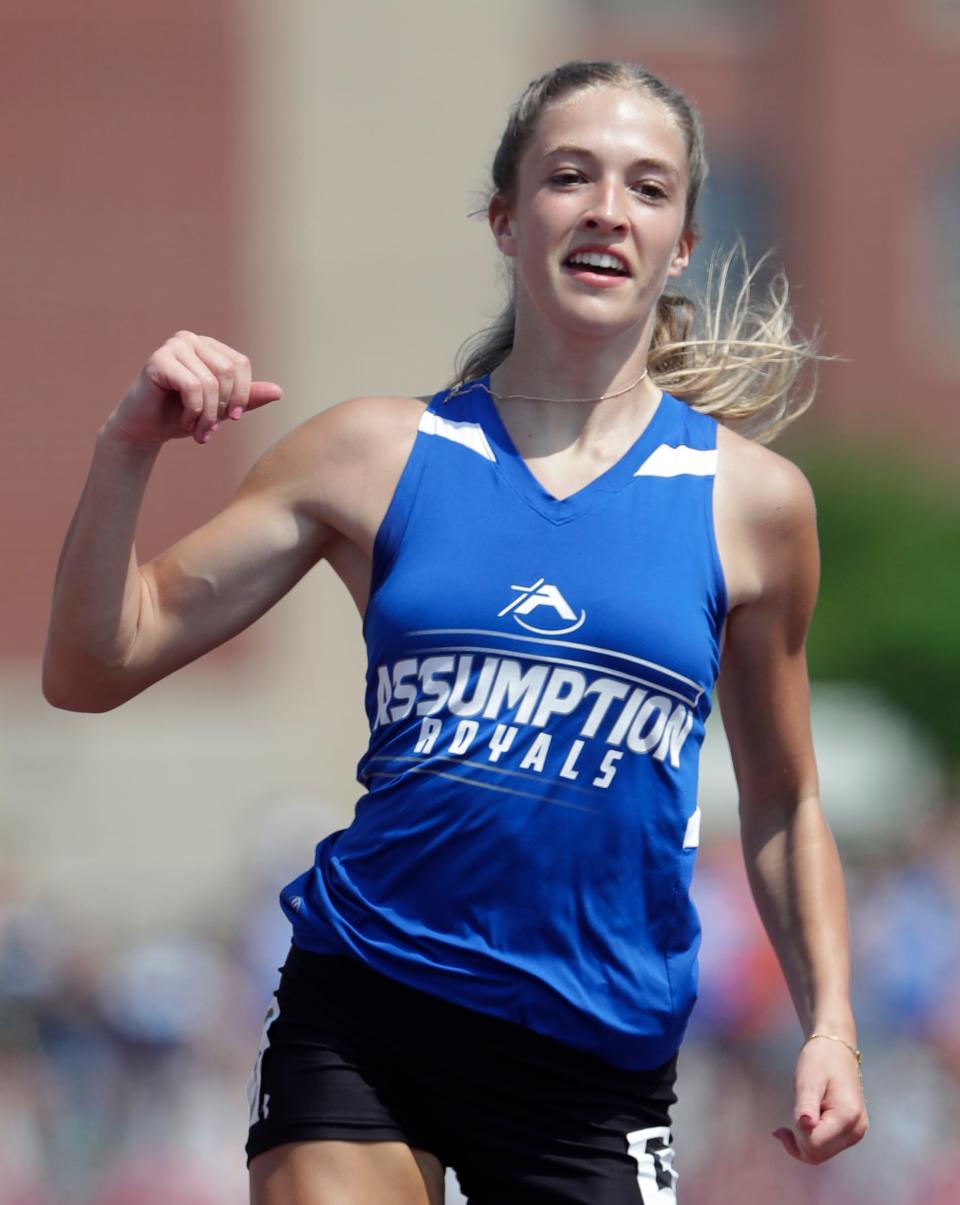 Assumption's Bella Thomas reacts after winning the 100-meter dash in Division 3 at the WIAA state track and field championships Saturday in La Crosse.